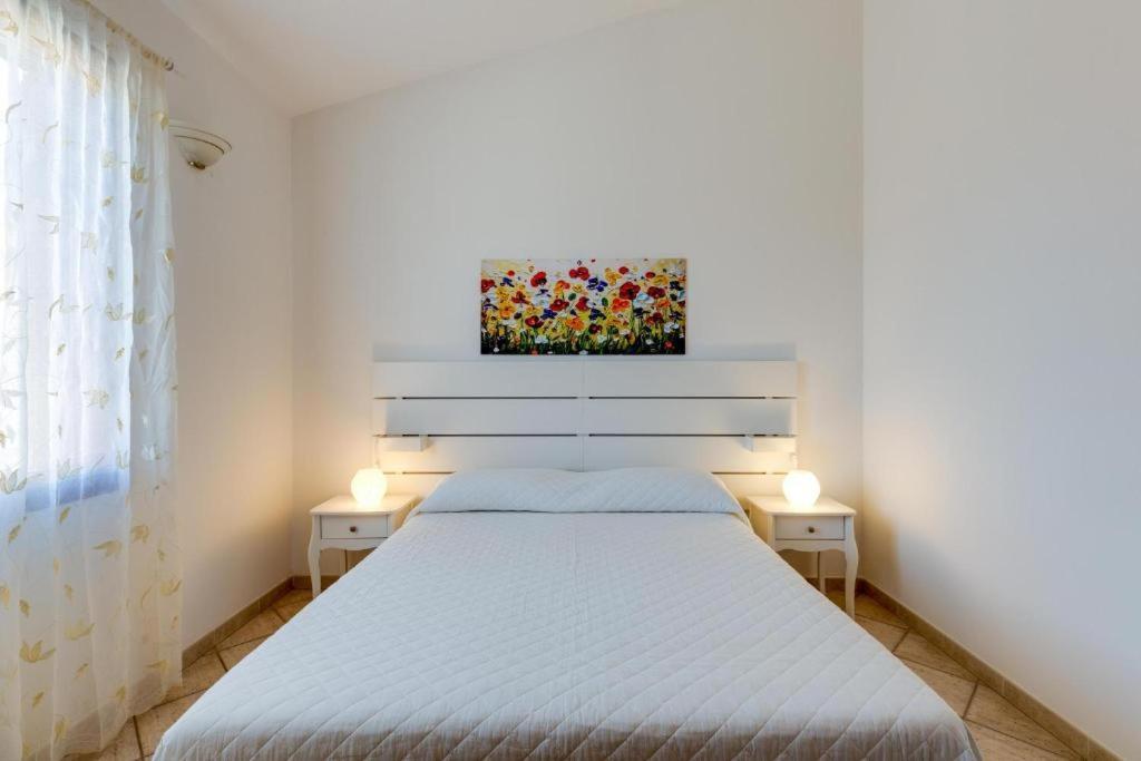 La Casa Delle Zie - Cabras Villa Buitenkant foto